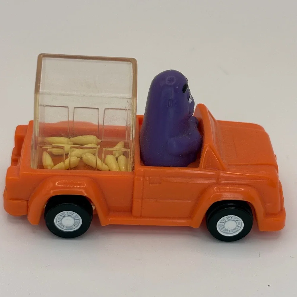 Vintage 1995 McDonalds Happy Meal Toy Grimace Orange Pickup Truck Corn Rattle
